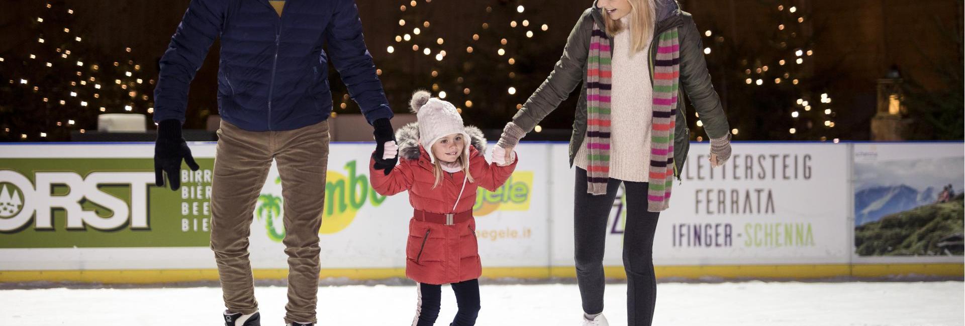 A family is ice skating